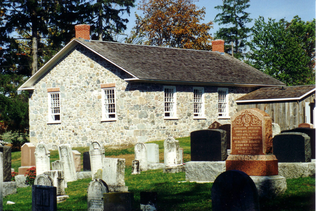 Meetinghouse, with some of cemetery in front of photo
